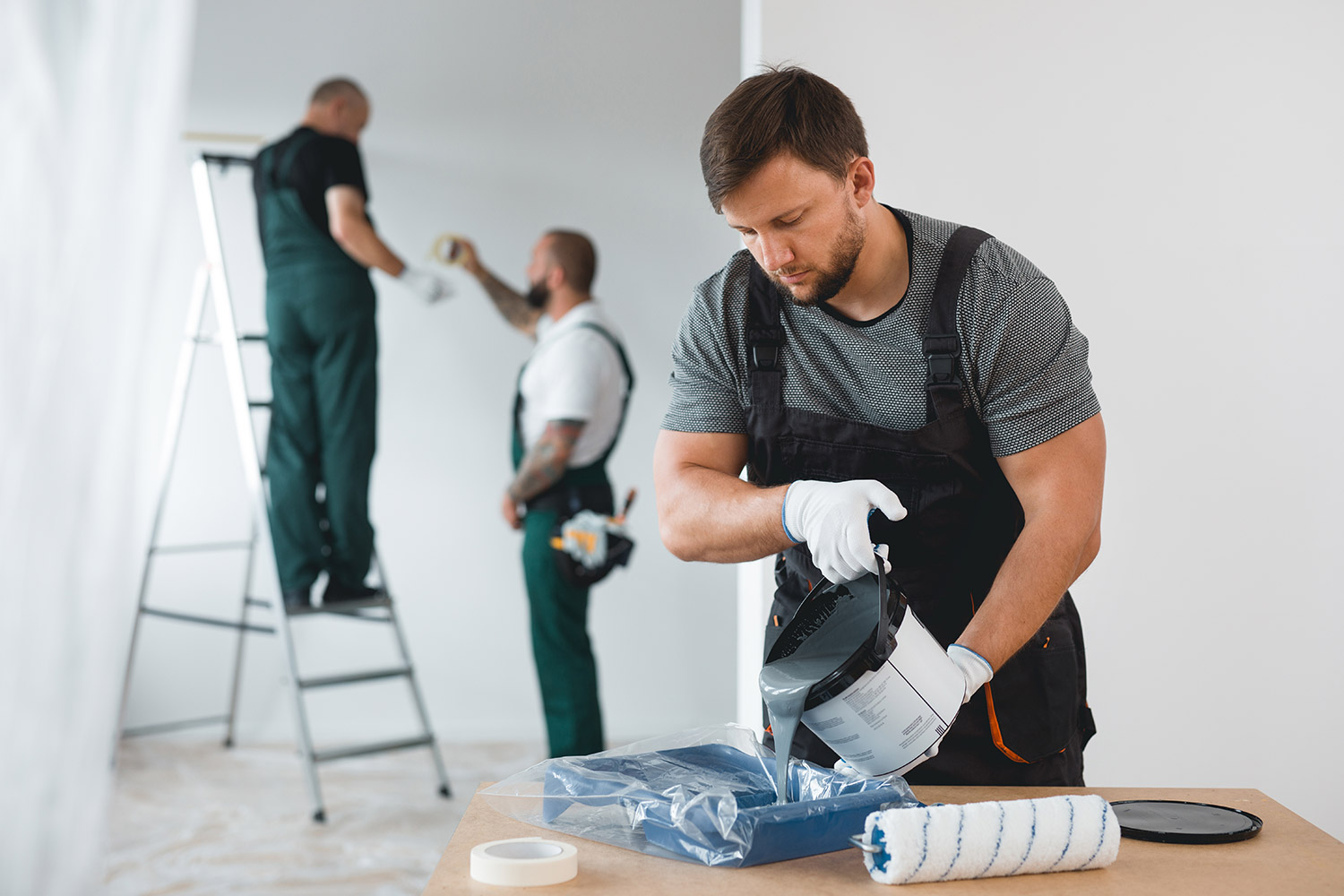 efficient-renovation-crew-painting-white-walls-of-2021-08-27-14-49-07-utcWeb