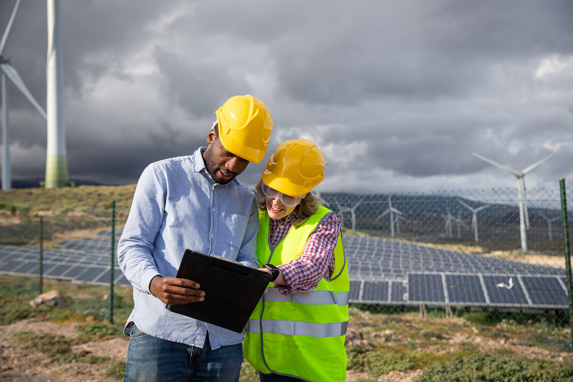 two-colleagues-consult-documents-while-at-a-photov-2023-02-16-01-00-35-utcWeb